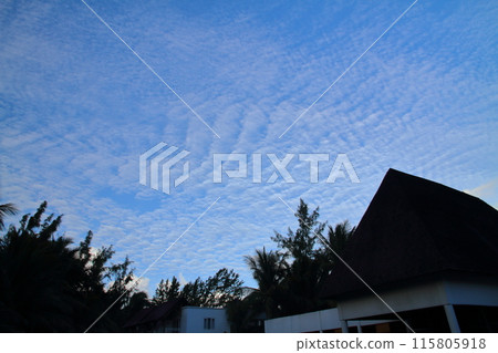 Mauritius, the Lady of the Indian Ocean. Morning sky in the Brabant Peninsula, a resort town at the foot of Mount Le Morne, a World Heritage Site. Mauritius, the Lady of the Indian Ocean. Morning sky in the Brabant Peninsula, a resort town at the foot of Mount Le Morne, a World Heritage Site. 115805918