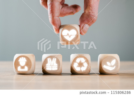 Health, Safety, and Environment (HSE) Concept with Wooden Blocks Featuring Safety, Health, Recycling, and Sustainability Icons 115806286