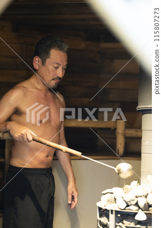 A man in his 50s enjoying the sauna A man in his 50s enjoying the sauna 115807273