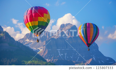 Colorful hot air balloons flying over beautiful mountain. 115807333