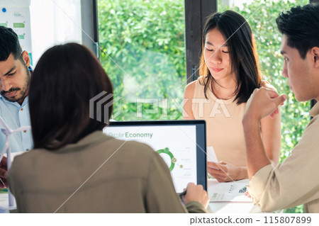 diversity team brainstorming discussion focused on ESG (environment,social,governance)  for sdgs goals in a sustainable green office 115807899