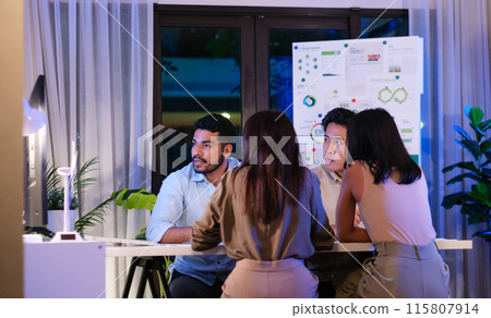 diversity team discusstion about esg and eco friendly system planning in sustainable green office at night 115807914