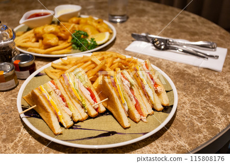 Room service clubhouse sandwich 115808176