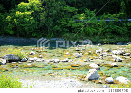 The clear, emerald-green Asemi River 115809798