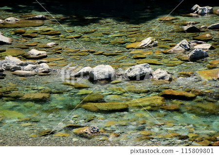 The clear, emerald-green Asemi River 115809801