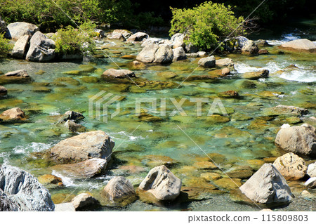 The clear, emerald-green Asemi River 115809803