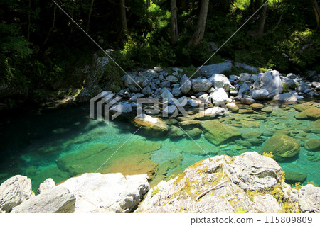 The clear, emerald-green Asemi River 115809809