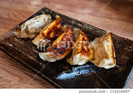 Very tasty gyoza from a Japanese ramen shop Very tasty gyoza from a Japanese ramen shop 115810697