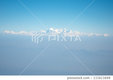 A beautiful view of the Nepal Himalayas from an airplane window A beautiful view of the Nepal Himalayas from an airplane window 115811699