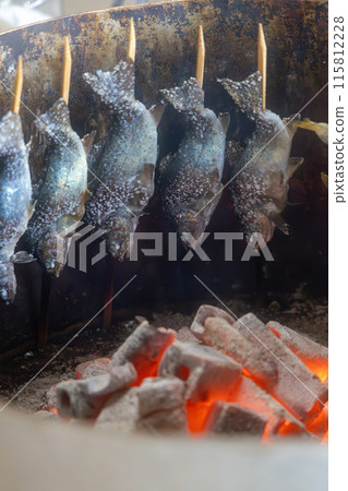 Salt-grilled river fish 115812228
