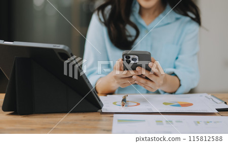 Asian woman working at the office. woman using laptop computer on desk at office 115812588