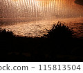 A river lit by fireworks 115813504