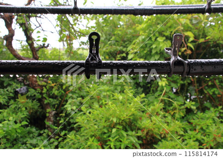 Image of the rainy season (clothesline wet with rain) Image of the rainy season (clothesline wet with rain) 115814174