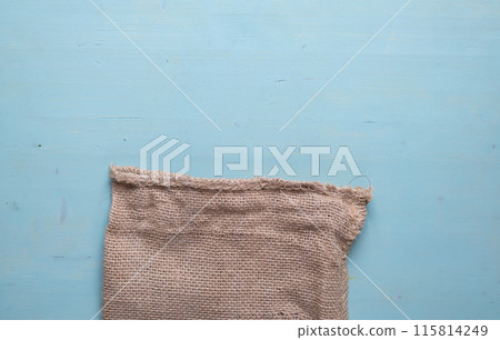 Hemp cloth bag on blue background Hemp cloth bag on blue background 115814249