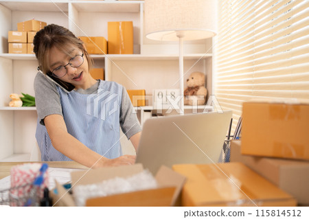 Sell products online, Young woman Multitasking: take orders from customers who call by phone, Young woman who has a lot of work and is very busy with work, Freelance working. 115814512