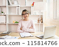 Young woman sitting at computer desk working, Smiling young man ready for work at the start of the week, Work for home. 115814766