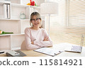 Young woman sitting at computer desk working, Smiling young man ready for work at the start of the week, Work for home. 115814921