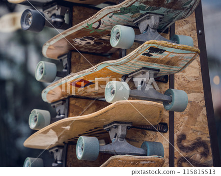 A stack of skateboards on a special outdoor stand 115815513