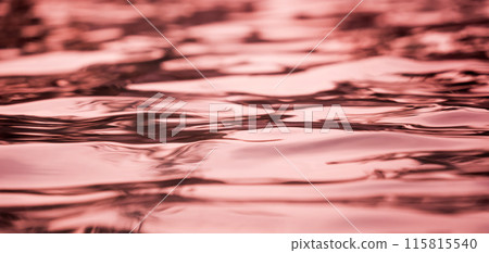 A image of violet ocean waves featuring a water surface in detail A image of violet ocean waves featuring a water surface in detail 115815540