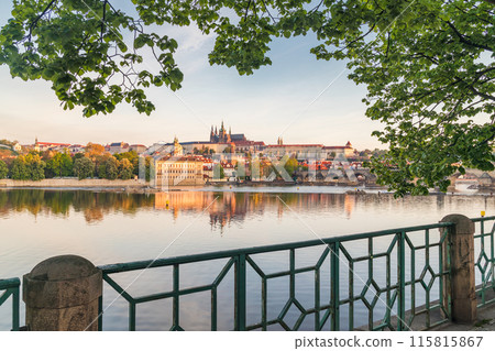 Prague Castle at sunrise, view from the embankment of the Vltava river. 115815867