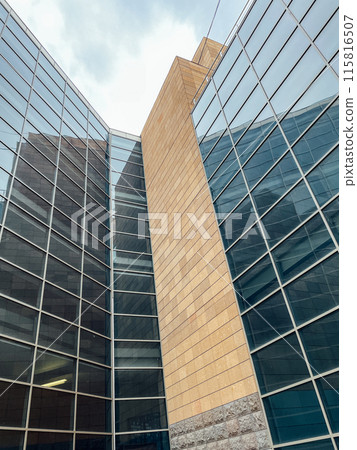 Interior of a stone glass modern building in the city 115816507