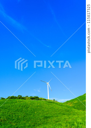 A view of wind power plants towering over the vast outdoors against the backdrop of a blue sky (Aso Nishihara Wind Farm) A view of wind power plants towering over the vast outdoors against the backdrop of a blue sky (Aso Nishihara Wind Farm) 115817325