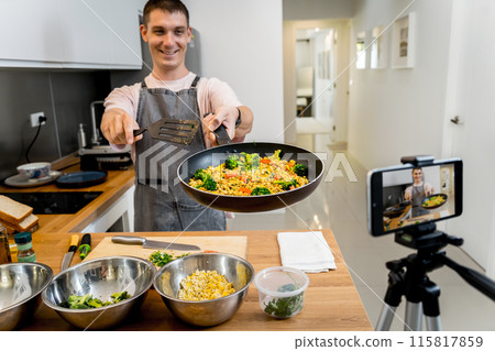 The chef is broadcasting live from workshop how to prepare a vegetarian food 115817859