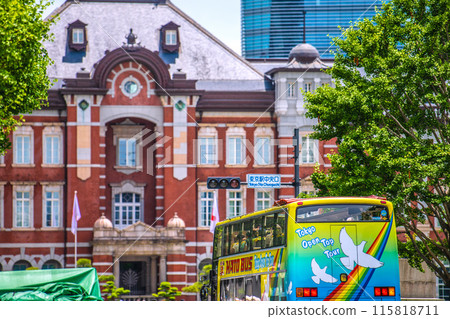 Tokyo cityscape in Japan Inbound tourism revival (bustling Tokyo Station area). Tokyo Station central exit and buses with foreign tourists boarding Tokyo cityscape in Japan Inbound tourism revival (bustling Tokyo Station area). Tokyo Station central exit and buses with foreign tourists boarding 115818711
