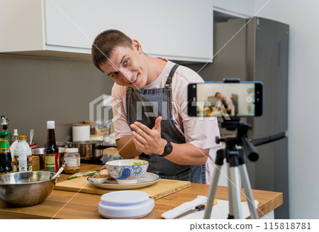 The chef is broadcasting live from workshop how to prepare a vegetarian food 115818781