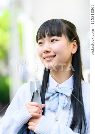 Female student with school bag Female student with school bag 115818865