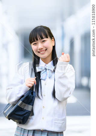 Female student with school bag, gut pose 115818900