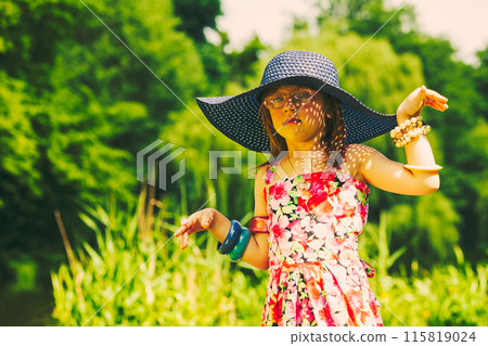 Little girl child on picnic. Summer leisure. Little girl child on picnic. Summer leisure. 115819024
