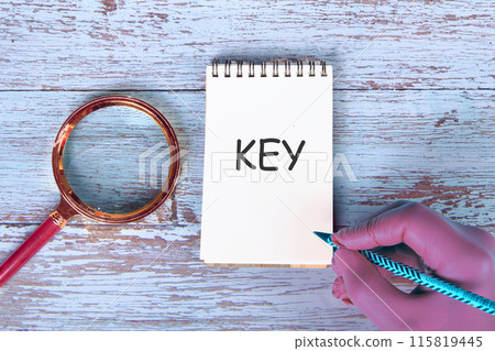 The text KEY It is written in the notebook by hand The text KEY It is written in the notebook by hand 115819445