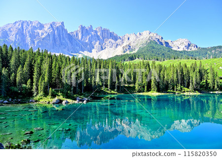 Lake Carezza and the Latemar peaks in the Dolomites Lake Carezza and the Latemar peaks in the Dolomites 115820350