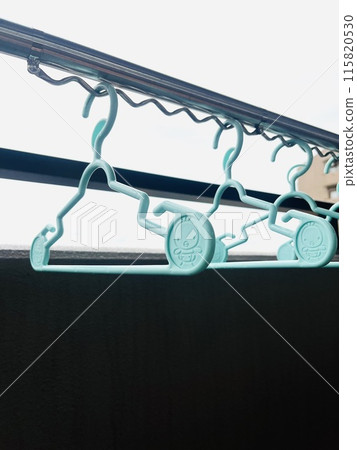 Drying laundry outside 115820530