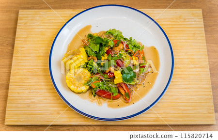 Spicy glass noodle salad on the white plate 115820714
