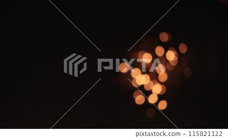 Blurred background of fireworks over night city stop motion aesthetic Blurred background of fireworks over night city stop motion aesthetic 115821122
