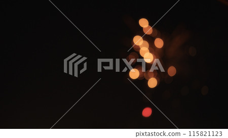 Blurred background of fireworks over night city stop motion aesthetic Blurred background of fireworks over night city stop motion aesthetic 115821123