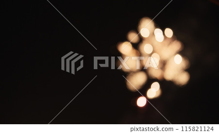 Blurred background of fireworks over night city stop motion aesthetic Blurred background of fireworks over night city stop motion aesthetic 115821124