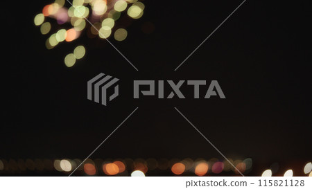 Blurred background of fireworks over night city stop motion aesthetic Blurred background of fireworks over night city stop motion aesthetic 115821128