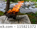 Bonfire on the riverbank, outdoors 115821372
