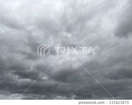 Gray clouds covering the sky on a cloudy day 115821673