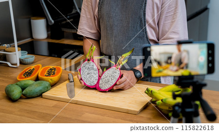 The chef is broadcasting live from workshop how to cuts and peels dragon fruit 115822618