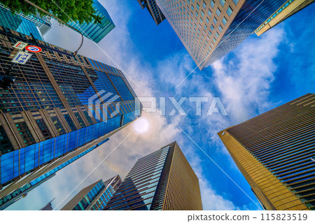 Tokyo cityscape in Japan. A halo appears... Clouds break and blue skies appear... June. Skyscrapers and other buildings can be seen from the Otemachi intersection = 22nd Tokyo cityscape in Japan. A halo appears... Clouds break and blue skies appear... June. Skyscrapers and other buildings can be seen from the Otemachi intersection = 22nd 115823519