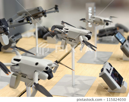 Modern drone for video and photo in the light store Modern drone for video and photo in the light store 115824030
