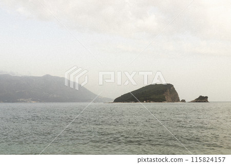 Aerial view saint nikola island in the sea near budva. cloudy weather 115824157