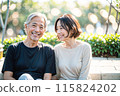 Senior Asian couple smiling on the beach 115824202
