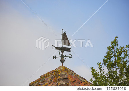 Antique weather vane on the roof in Denmark Antique weather vane on the roof in Denmark 115825038