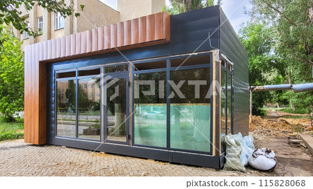 Construction of a street shopping pavilion for a store, all stages of construction, detailed overview Construction of a street shopping pavilion for a store, all stages of construction, detailed overview 115828068