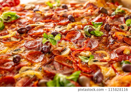 Delicious pizza with pepperoni 115828116